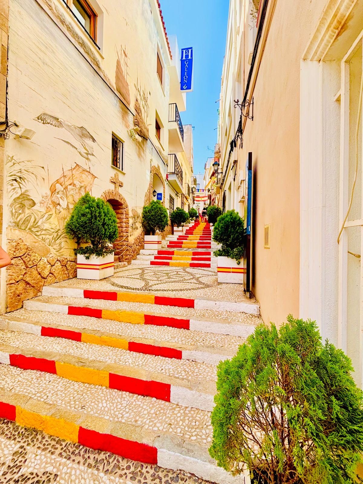The colourful tiled Spanish Steps climbing through Calpe old town