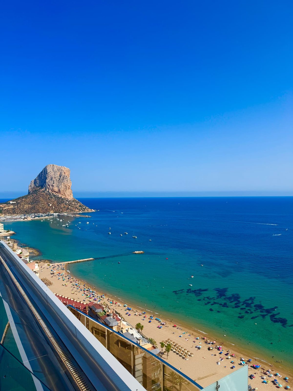 Calpe's sandy Arenal-Bol beach and turquoise water below the Peñón de Ifach