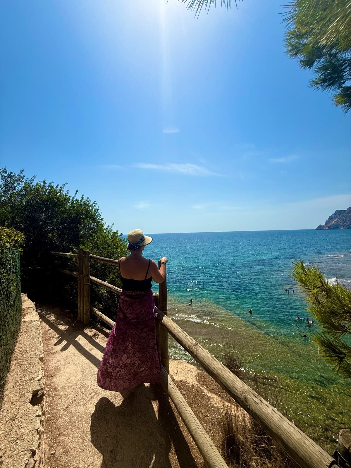 A coastal path above clear turquoise water on the Calpe coastline